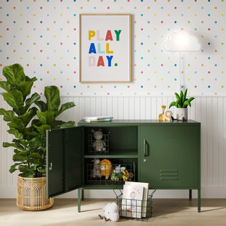 The Oxford metal storage locker in forest green with two doors, one open showing baskets of toys inside
