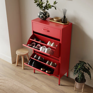 The Shoreditch shoe cabinet in red with a top drawer, two lower shoe compartments and matching handles, styled in a hallway.