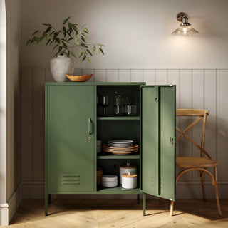 The Fulham metal storage locker in forest green with 2 doors, one open showing tableware inside 