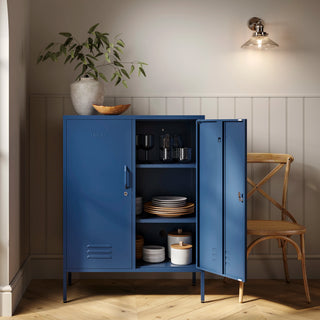 The Fulham metal storage locker in navy blue with 2 doors, one open showing tableware inside 