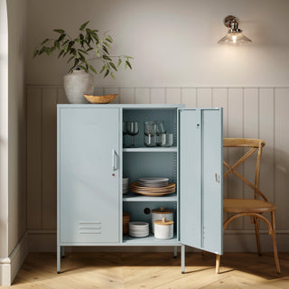 The Fulham metal storage locker in sky blue with 2 doors, one open showing tableware inside 