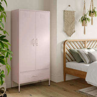 Metal, tall, double-door and single-drawer storage locker in light pink, in a bedroom