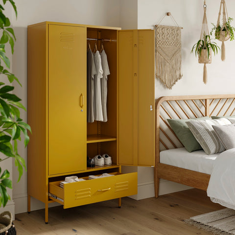 Metal, tall, double-door and single-drawer storage locker in mustard yellow, open showing clothes and shoes, in a bedroom