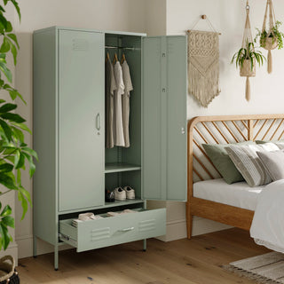 Metal, tall, double-door and single-drawer storage locker in sage green, open showing clothes and shoes, in a bedroom