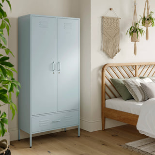 Metal, tall, double-door and single-drawer storage locker in sky blue, in a bedroom