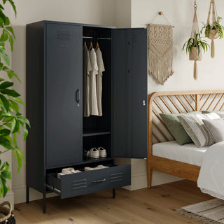 Metal, tall, double-door and single-drawer storage locker in slate grey, open showing clothes and shoes, in a bedroom