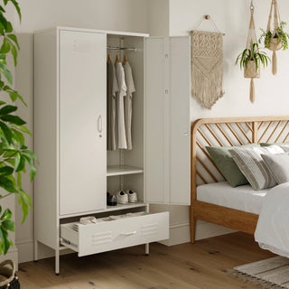 Metal, tall, double-door and single-drawer storage locker in vanilla, open showing clothes and shoes, in a bedroom