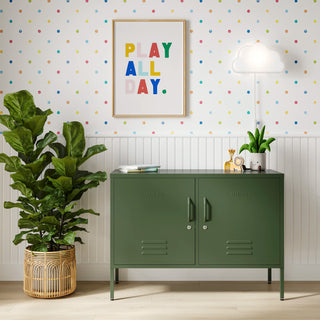 The Oxford metal storage locker in forest green with two doors, with books and toys on top