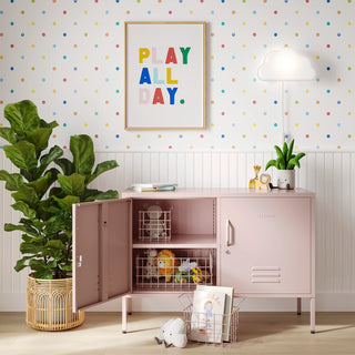 The Oxford metal storage locker in light pink with two doors, one open showing baskets of toys inside 