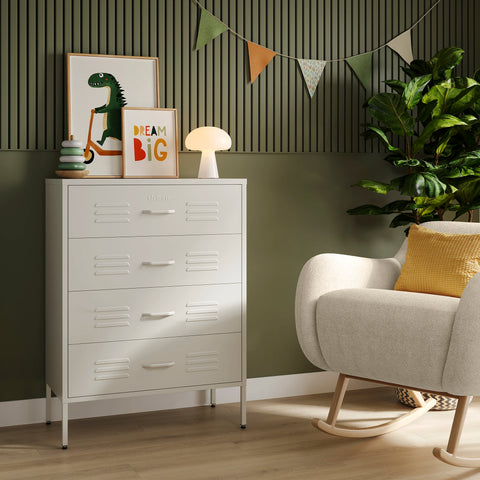 The Harrow vanilla metal drawers with 4 drawers, in a room next to a chair