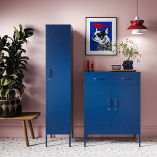 The Bexley single-door tall storage locker and a metal storage locker with 2 doors and 2 drawers, both in navy blue next to each other in a room