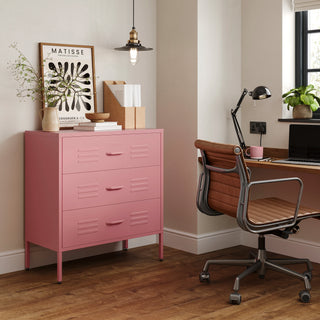 The Lambeth metal drawers in flamingo pink, in a room next to a desk