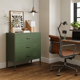 The Lambeth metal drawers in forest green, in a room next to a desk