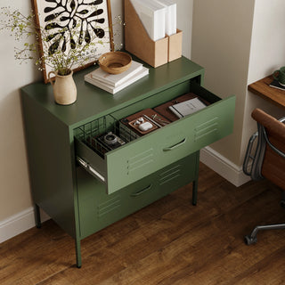 The Lambeth metal storage drawers in forest green, with one draw open showing a basket and books 