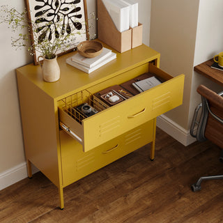 The Lambeth metal storage drawers in mustard yellow, with one draw open showing a basket and books 