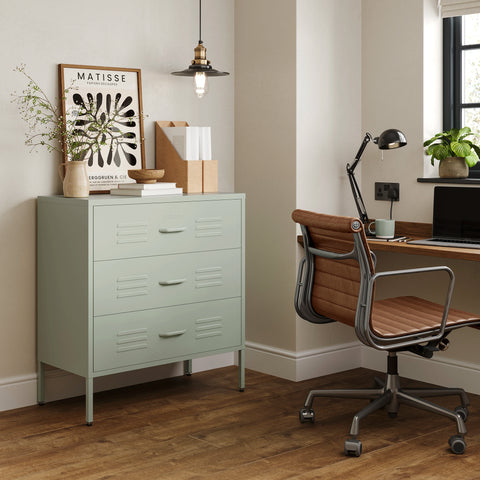 The Lambeth metal drawers in sage green, in a room next to a desk