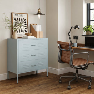 The Lambeth metal drawers in sky blue, in a room next to a desk