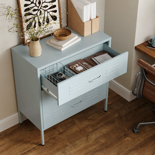 The Lambeth metal storage drawers in sky blue, with one draw open showing a basket and books 