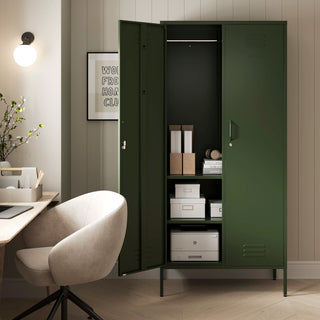 The Chelsea tall double-door metal storage locker in forest green with one door open, in a room