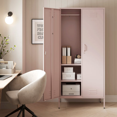 The Chelsea tall double-door metal storage locker in light pink with one door open, in a room