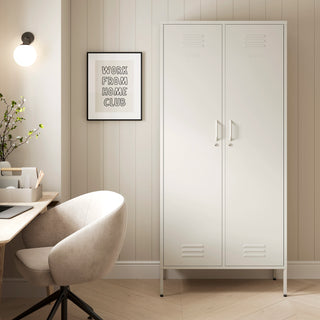 The Chelsea tall double-door metal storage locker in vanilla in a room