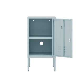 The Camden metal bedside table storage locker in sky blue, with the door open